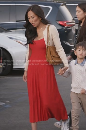 Katie’s red pleated sleeveless dress on The Real Housewives of Orange County