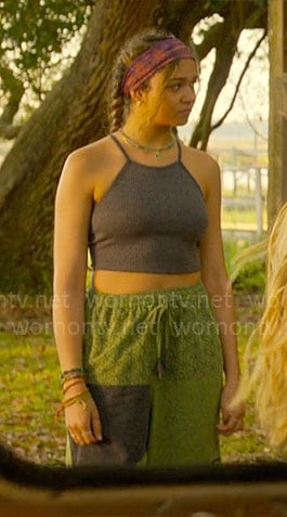 Kiara’s grey tank top and green patchwork pants on Outer Banks
