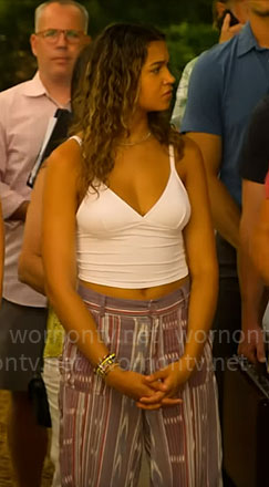 Kiara’s white cami and printed pants on Outer Banks