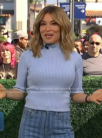 kit’s blue ribbed top and striped jeans on Access Hollywood