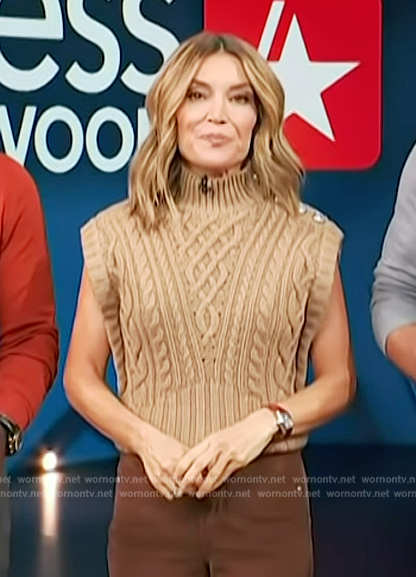 Kit’s beige button shoulder cable knit vest and jeans on Access Hollywood