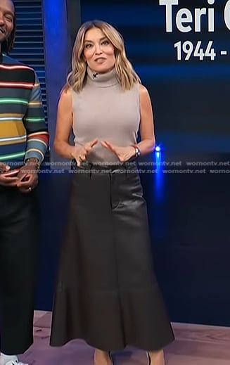 Kit’s dark brown leather midi skirt on Access Hollywood