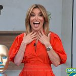 Kit’s red button down mini dress on Access Hollywood