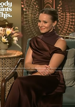 Kristen Bell’s brown turleneck top and one shoulder dress on Access Hollywood