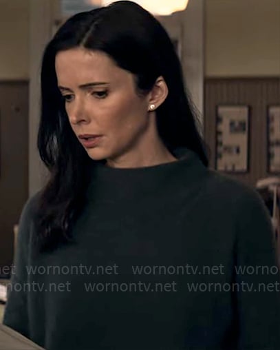 Lois’s dark funnel-neck sweater on Superman and Lois