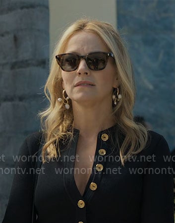 Lorna’s black mini dress with gold buttons on The Lincoln Lawyer