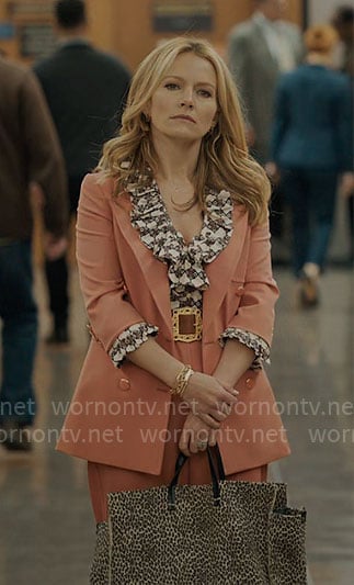 Lorna’s coral suit and leopard bag on The Lincoln Lawyer
