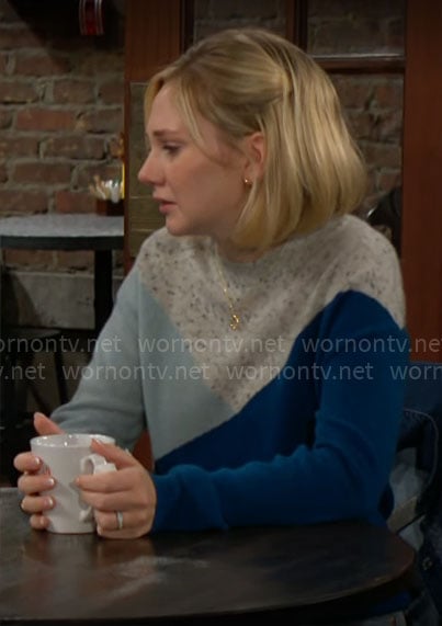 Lucy’s blue colorblock sweater on The Young and the Restless