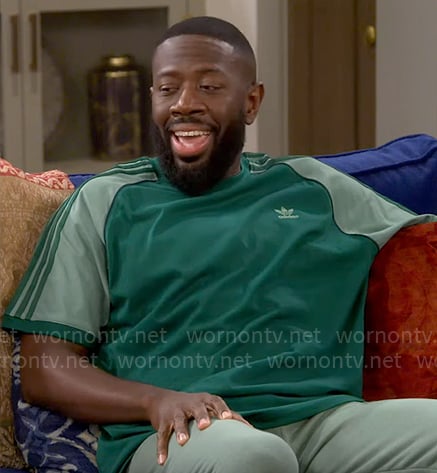 Malcolm’s green Adidas t-shirt on The Neighborhood