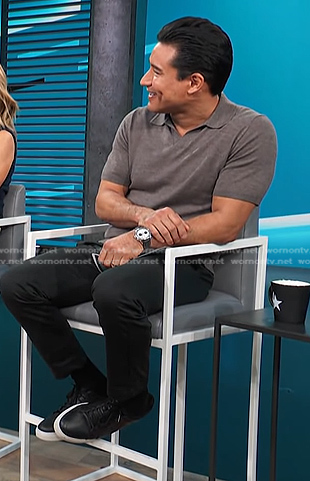 Mario’s grey polo and black sneakers on Access Hollywood