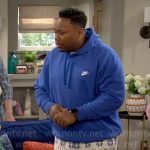 Marty’s blue Nike hoodie and printed shorts on The Neighborhood