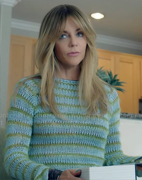 Morgan’s blue and green striped knit sweater on High Potential