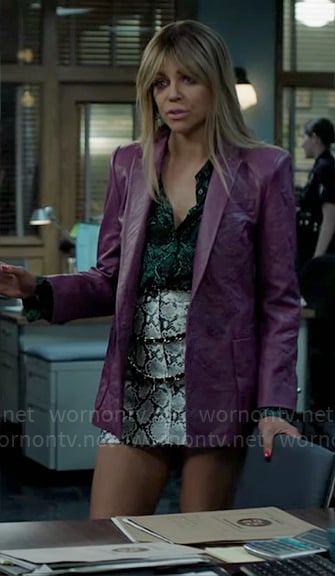 Morgan’s purple leather blazer, green snake print shirt, and mini skirt on High Potential