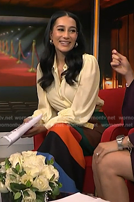 Morgan’s yellow blouse and striped skirt on NBC News Daily