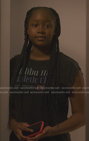 Naima’s Malibu Hills graphic tee on Reasonable Doubt