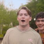 Nick’s green and pink Adidas sweatshirt on Heartstopper
