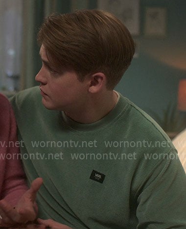Nick’s green corduroy sweatshirt on Heartstopper