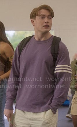 Nick’s purple t-shirt with striped sleeve on Heartstopper