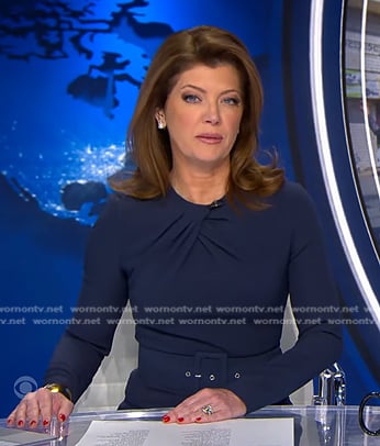 Norah’s navy belted sheath dress on CBS Evening News