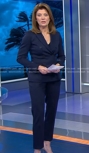 Norah’s navy double breasted blazer and pant suit on CBS Evening News