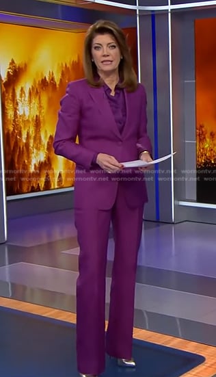 Norah’s purple tie neck blouse and suit on CBS Evening News