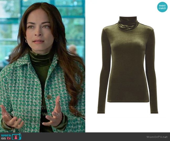 Proenza Schouler White Label Velvet-effect roll-neck top worn by Cassandra Lee (Kristin Kreuk) on Murder in a Small Town