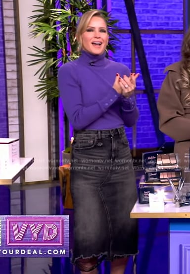 Sara’s purple turtleneck top and denim skirt on The View