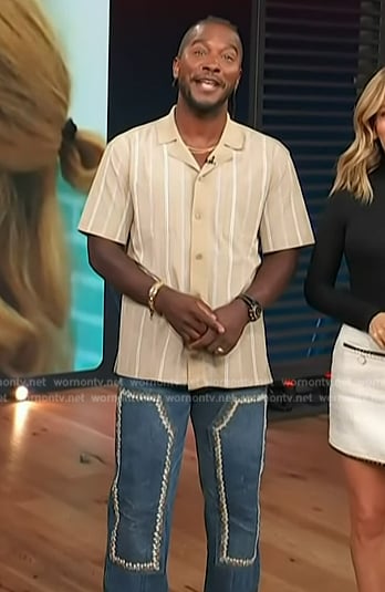 Scott’s embroidered jeans on Access Hollywood