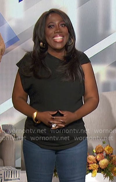 Sheryl’s black twisted top on The Talk