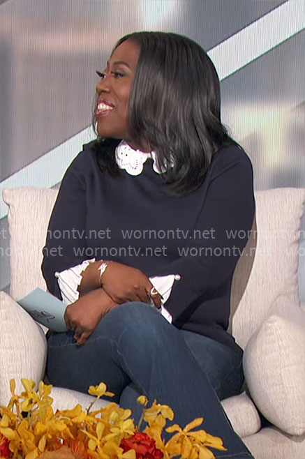 Sheryl’s navy sweater with white eyelet collar on The Talk