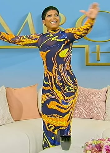 Tamron’s black sheer embellished dress on Tamron Hall Show