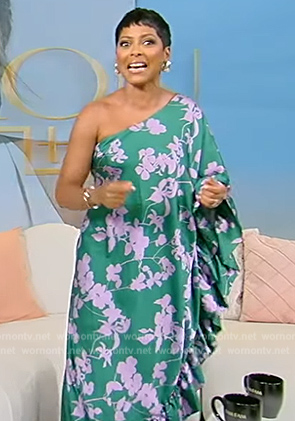 Tamron’s green floral one shoulder dress on Tamron Hall Show