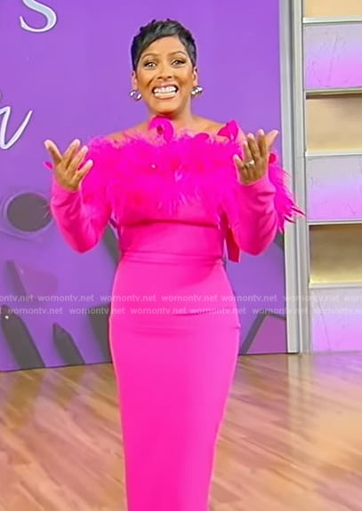 Tamron’s pink feather trim off shoulder dress on Tamron Hall Show