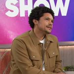Trevor’s beige jacket on The Kelly Clarkson Show