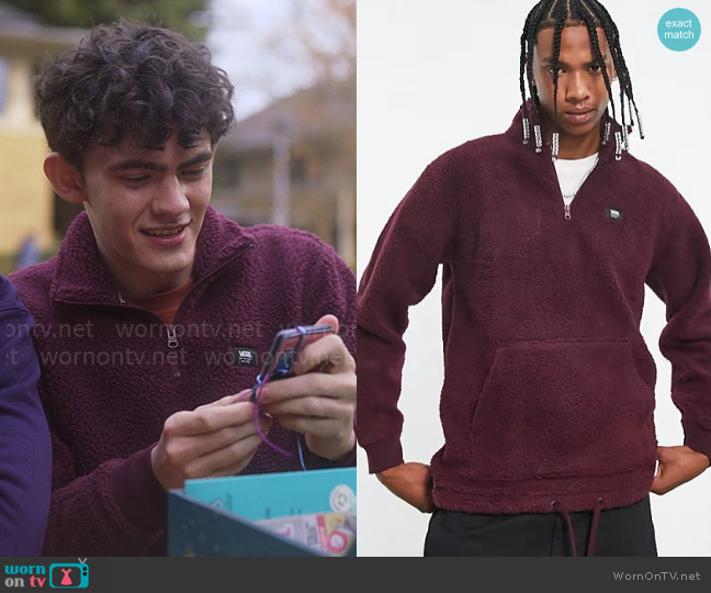 Vans Owen 1/4 zip sweatshirt in burgundy worn by Charlie Spring (Joe Locke) on Heartstopper