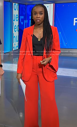Zinhle’s red blazer and pant suit on NBC News Daily