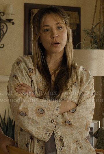 Ava’s beige floral robe on Based on a True Story