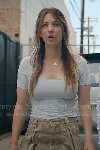 Ava’s light blue top and beige pants on Based on a True Story