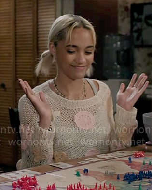 Ava’s white floral embroidered sweater on High Potential