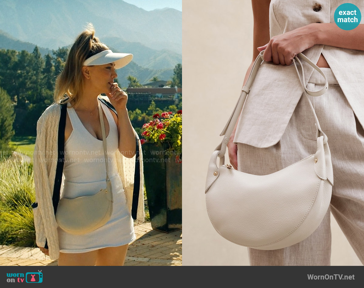 Banana Republic Vida Half-Moon Shoulder Bag in Ivory worn by Ava Bartlett (Kaley Cuoco) on Based on a True Story