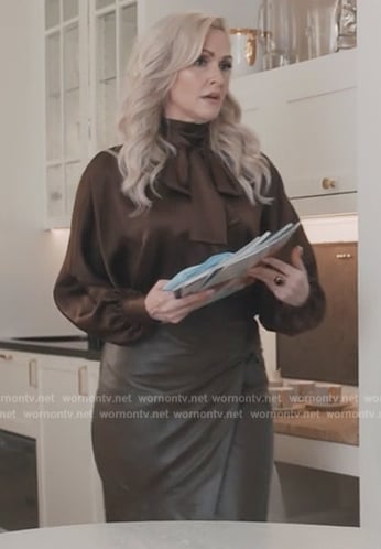 Celeste’s brown tie neck satin top and skirt on Elsbeth