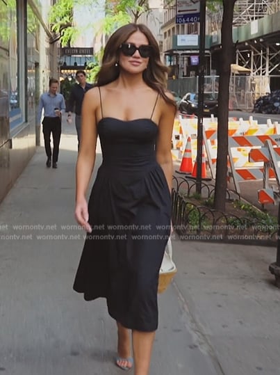 Brynn’s black strap dress and bag on The Real Housewives of New York City