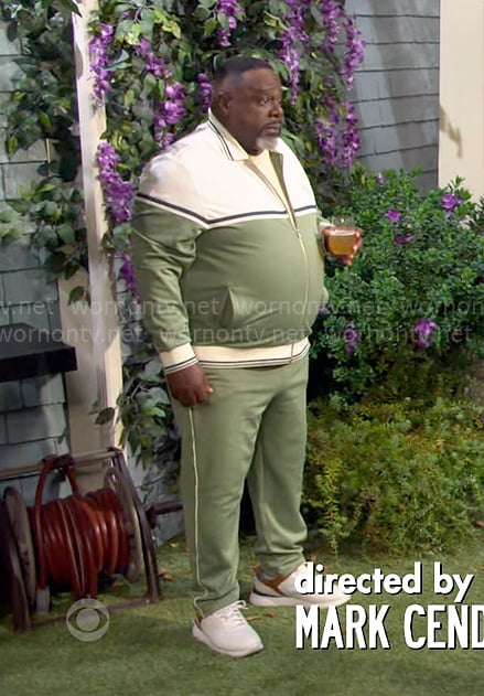 Calvin’s green and white colorblock track suit on The Neighborhood