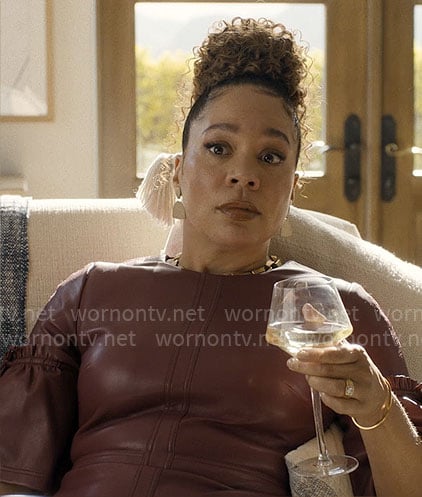Carolyn’s burgundy leather dress on Based on a True Story