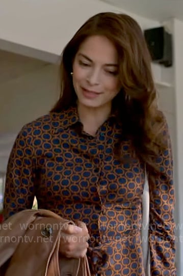 Cassandra’s circle print shirtdress on Murder in a Small Town