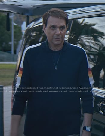 Daniel’s sweater with striped sleeves on Cobra Kai