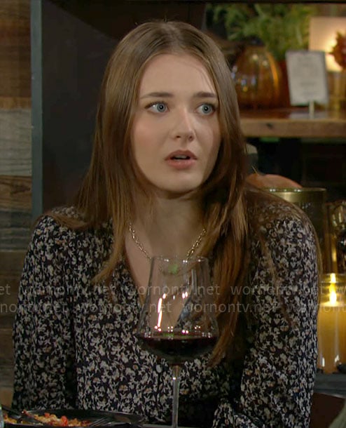 Faith’s navy floral v-neck dress on The Young and the Restless