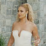 Gizelle’s white off shoulder dress on The Real Housewives of Potomac