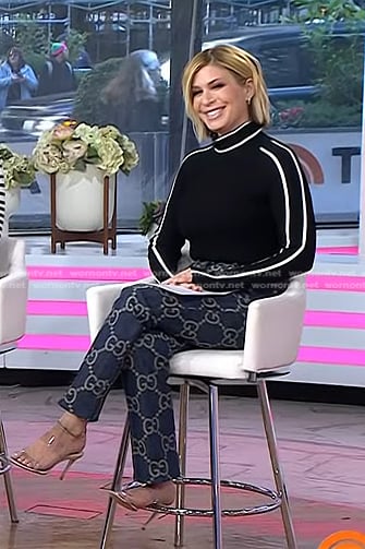 Jill’s black contrast piping sweater and logo print jeans on Today