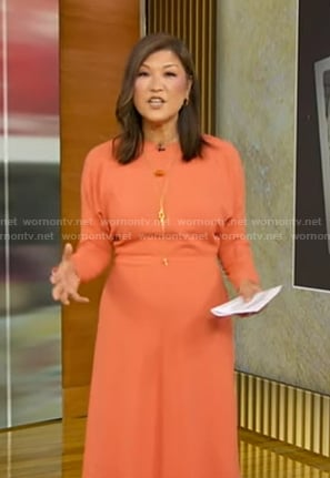 Juju’s orange long sleeve midi dress on Good Morning America